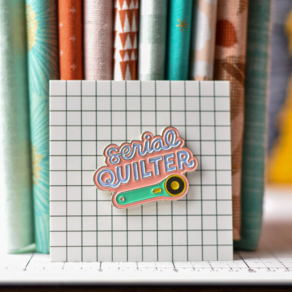 Knot+Thread Design & Coco West Illustration Serial Quilter (White or Pink) Soft Enamel Pin